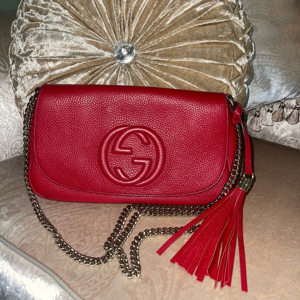 Red Gucci Crossbody bag with embossed Gs with gold hardware